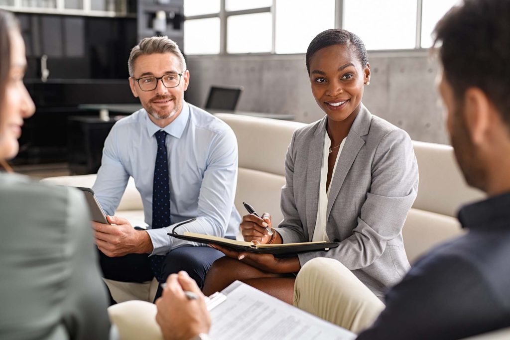 Multi-ethnic group interviewing IT Specialist